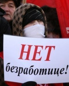 Russian communist party supporter holds